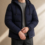 Cirrus Hooded Puffer Jacket in Navy Blue